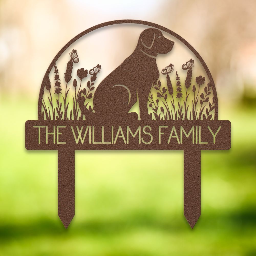 Personalized copper metal yard stake featuring a sitting dog silhouette, wildflowers, butterflies, and custom family name 'The Williams Family' – decorative garden sign for dog lovers.