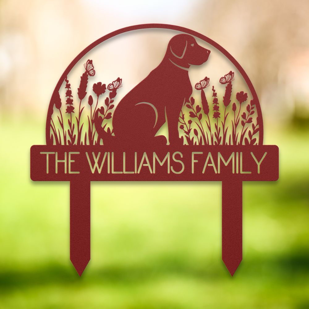 Personalized red metal yard stake featuring a sitting dog silhouette, wildflowers, butterflies, and custom family name 'The Williams Family' – decorative garden sign for dog lovers.