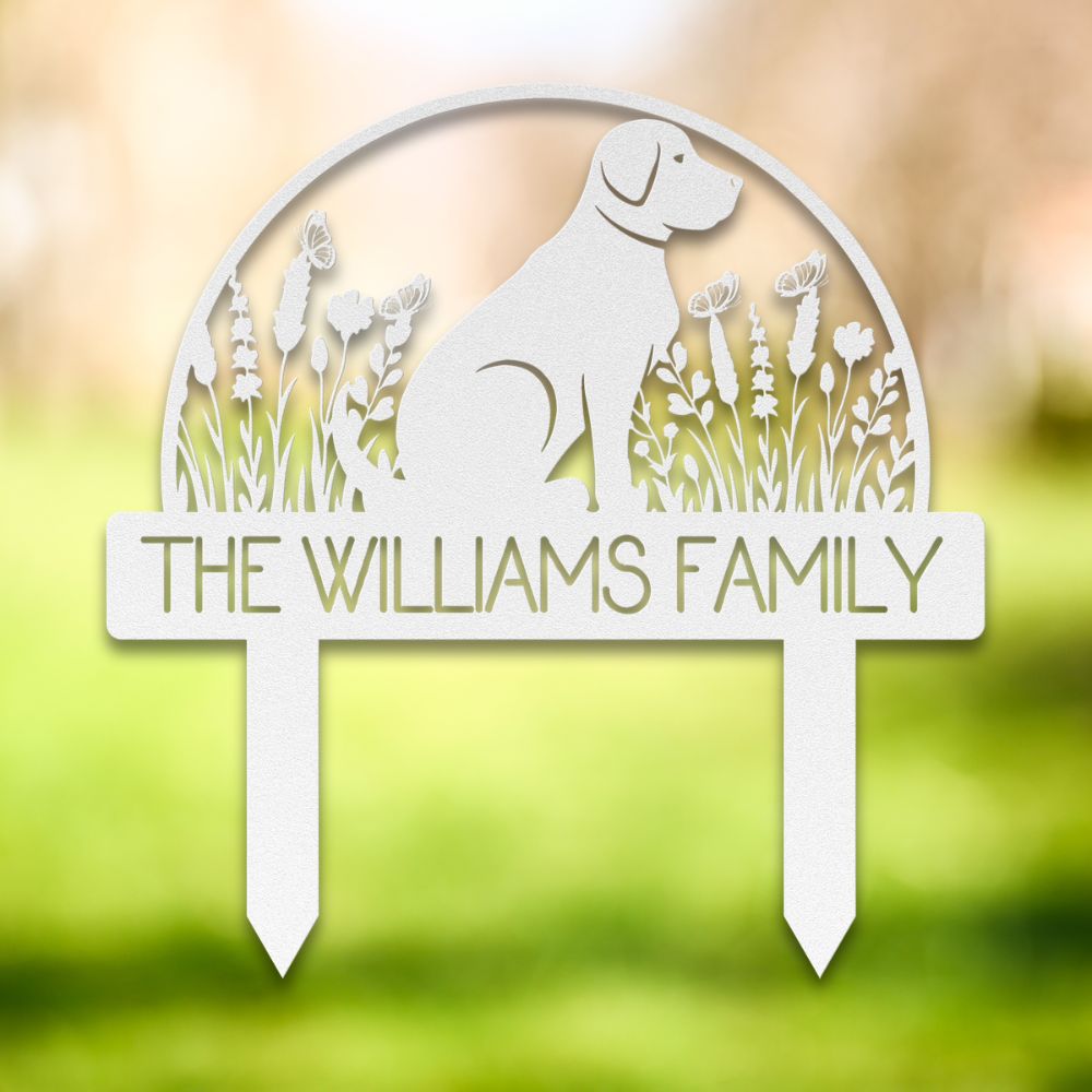 Personalized white metal yard stake featuring a sitting dog silhouette, wildflowers, butterflies, and custom family name 'The Williams Family' – decorative garden sign for dog lovers.