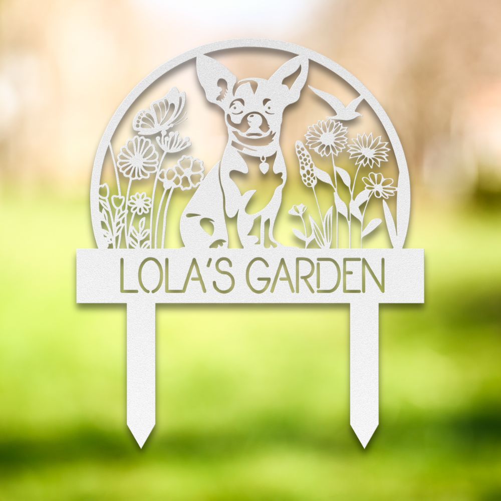 Personalized white metal dog garden yard stake with floral design, butterflies, and custom text reading 'Lola’s Garden' – decorative outdoor sign for dog lovers.