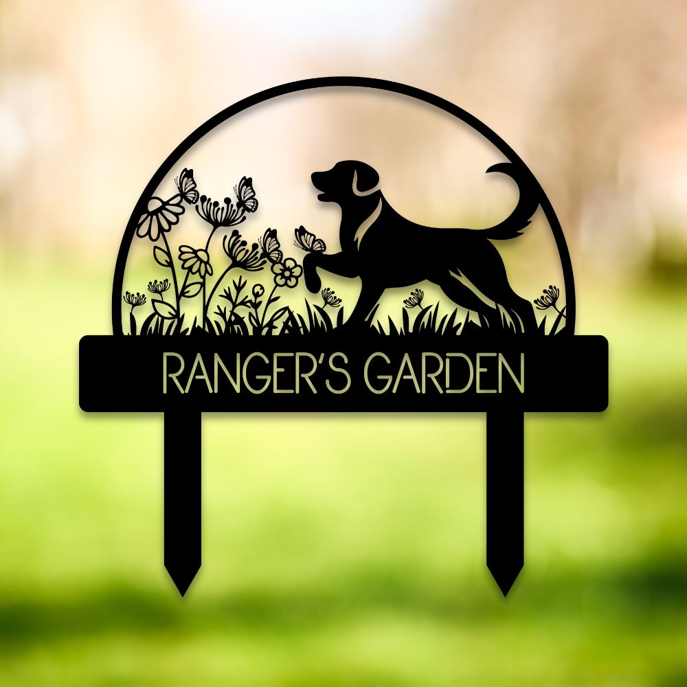 Custom metal dog garden stake featuring a playful Labrador-style silhouette surrounded by wildflowers and butterflies. Personalized outdoor yard sign with “RANGER'S GARDEN” cutout text – perfect pet memorial or dog lover gift for garden decor.