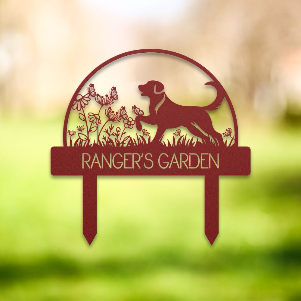 Custom metal dog garden stake featuring a playful Labrador-style silhouette surrounded by wildflowers and butterflies. Personalized outdoor yard sign with “RANGER'S GARDEN” cutout text – perfect pet memorial or dog lover gift for garden decor.