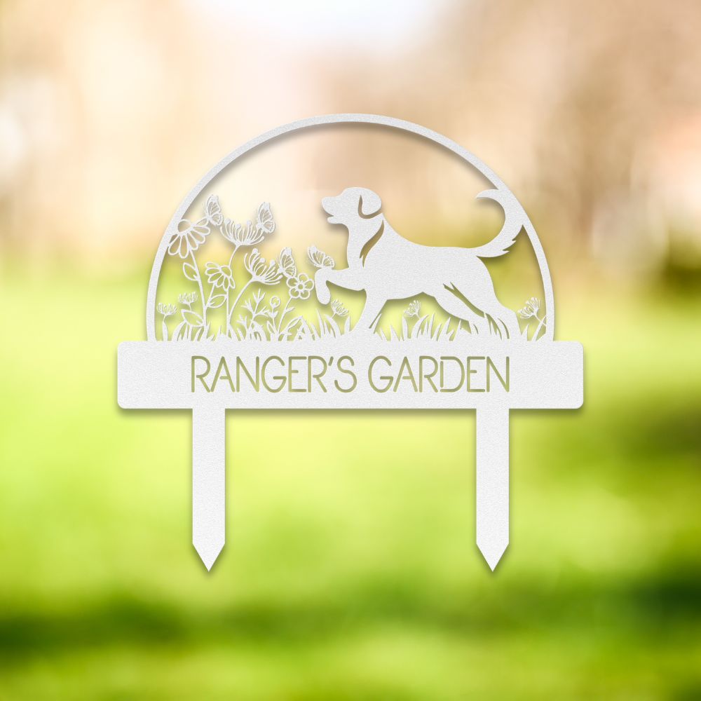 Custom metal dog garden stake featuring a playful Labrador-style silhouette surrounded by wildflowers and butterflies. Personalized outdoor yard sign with “RANGER'S GARDEN” cutout text – perfect pet memorial or dog lover gift for garden decor.
