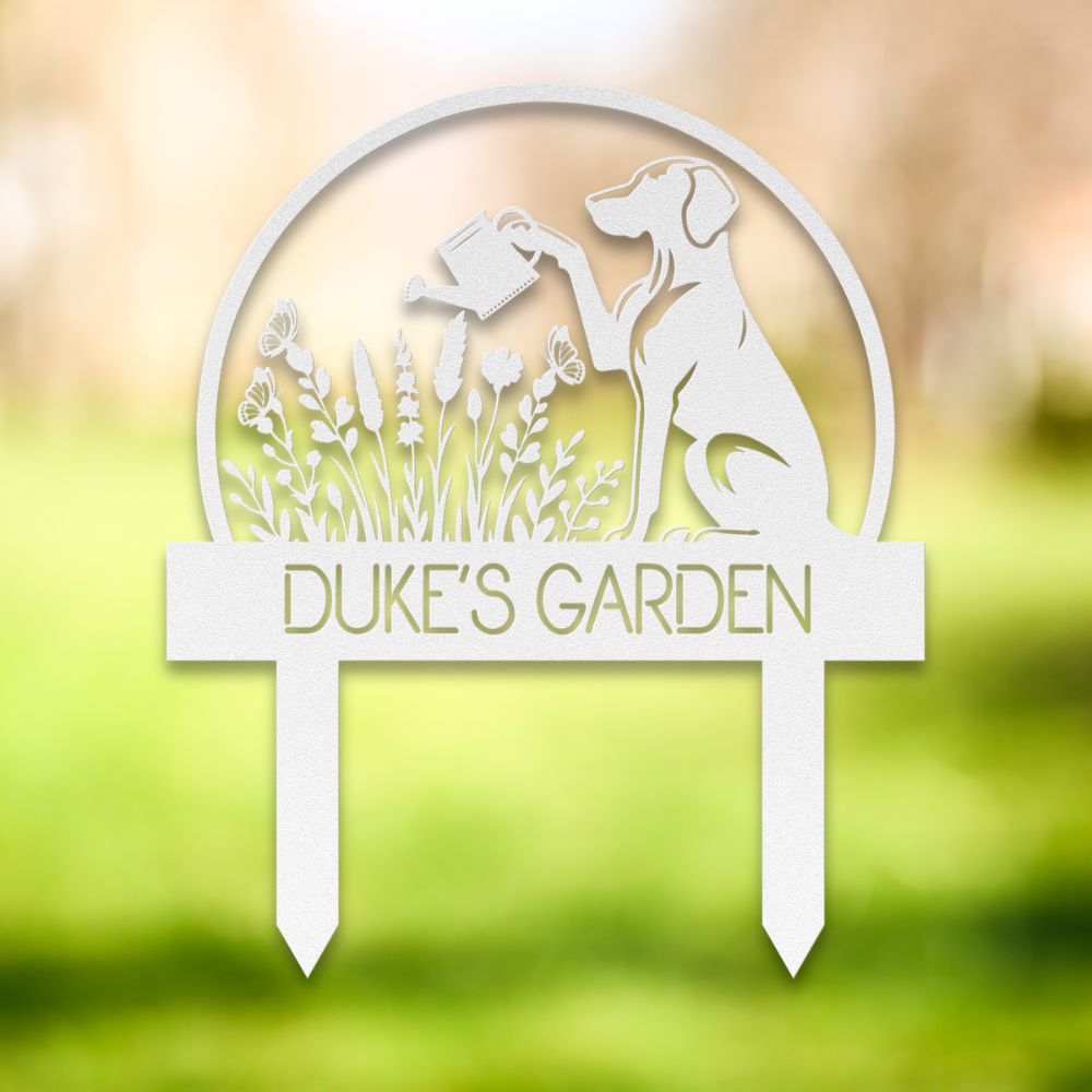 Personalized metal garden stake with dog silhouette holding a watering can, surrounded by flowers and butterflies. Custom “DUKE'S GARDEN” name sign – ideal gift for dog owners and unique outdoor yard decoration.